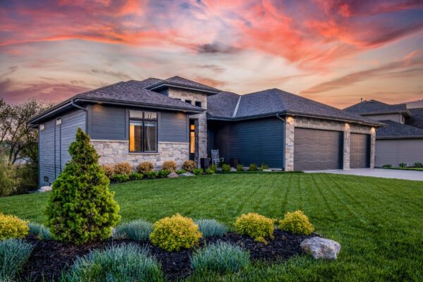 Luxury home during twilight golden hour with pink and purple sky